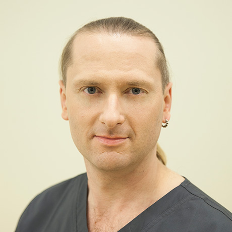 Team member at EGV smiling in professional setting