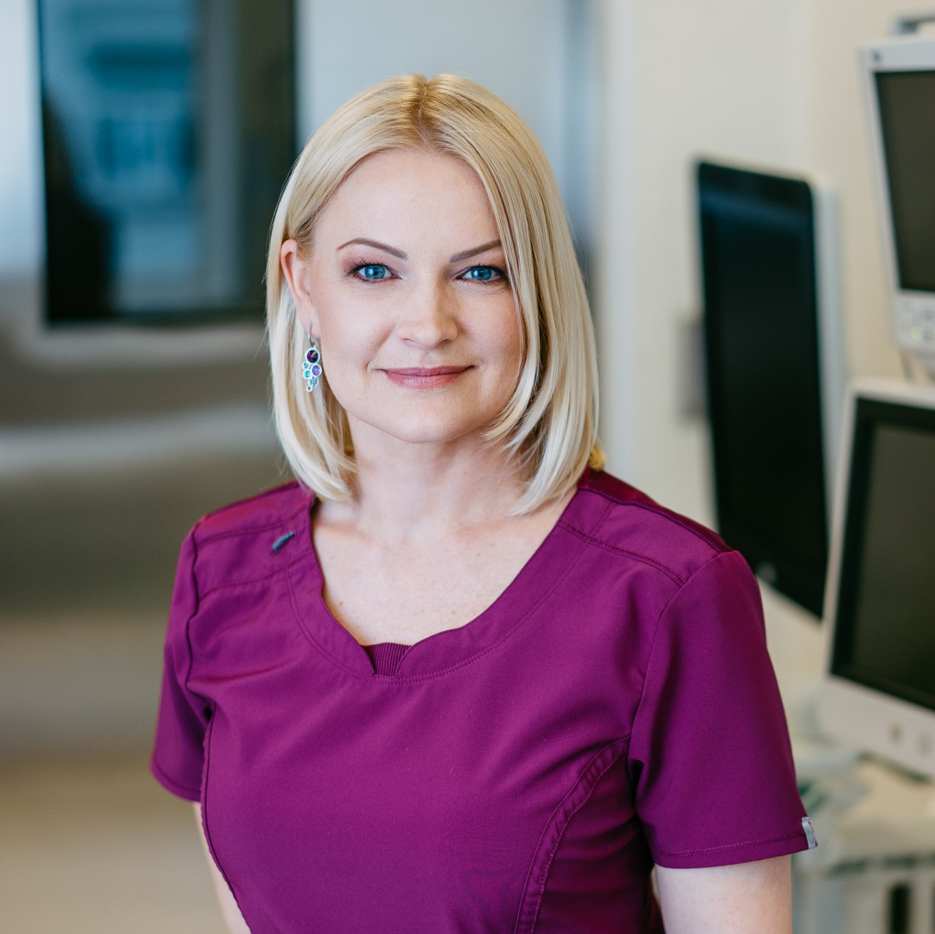 Portrait of a woman in professional attire at EGV