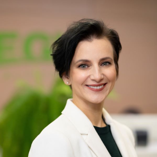 Portrait of Dr. Ieva Arnte in medical attire